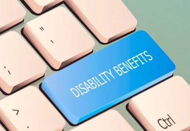 Part of a keyboard with a disability benefits key.