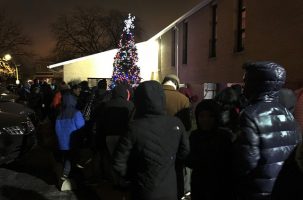 People flock the Ankin Law Office Toy Drive one December evening