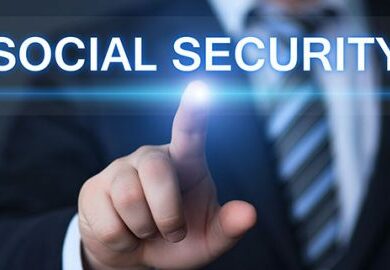 man in suit pointing at a glass window with social security printed on it.