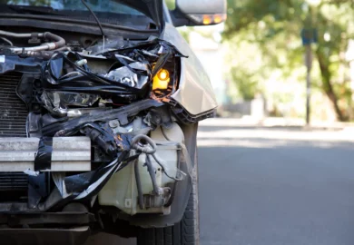 Image of a wrecked bumper of an suv.