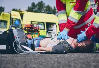 Man getting revived by a paramedic.