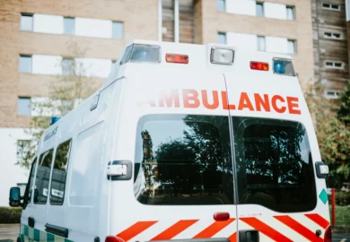 Ambulance parked outside a hospital.