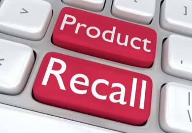 Product recall text on a keyboard.