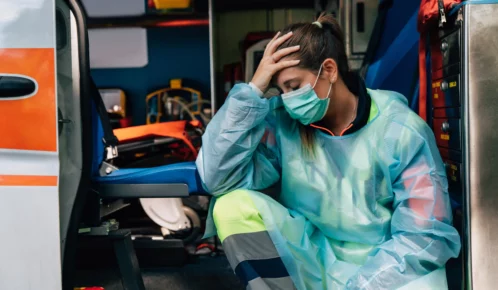 Distressed paramedics after a tragic accident.